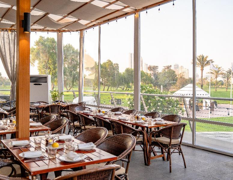 Carine Welcomes Summer with Pergola Dining and Dishes Made to Share 