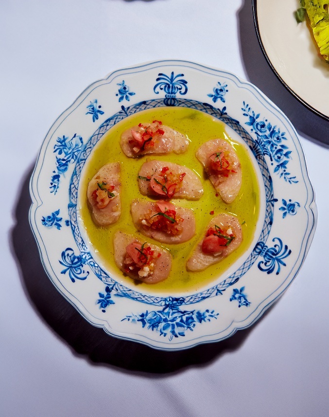 A plate of food on a tableAI-generated content may be incorrect.