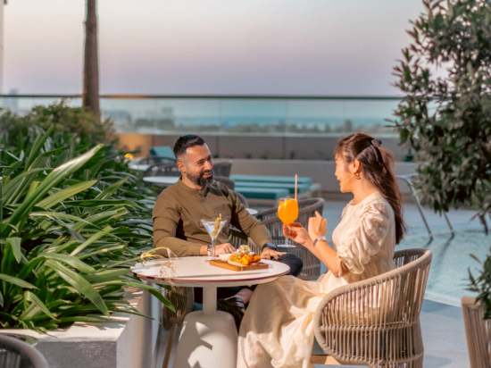 Relish Panoramic City Views and Relaxed Al Fresco Dining at Novotel Dubai Al Barsha’s Deck Se7en 